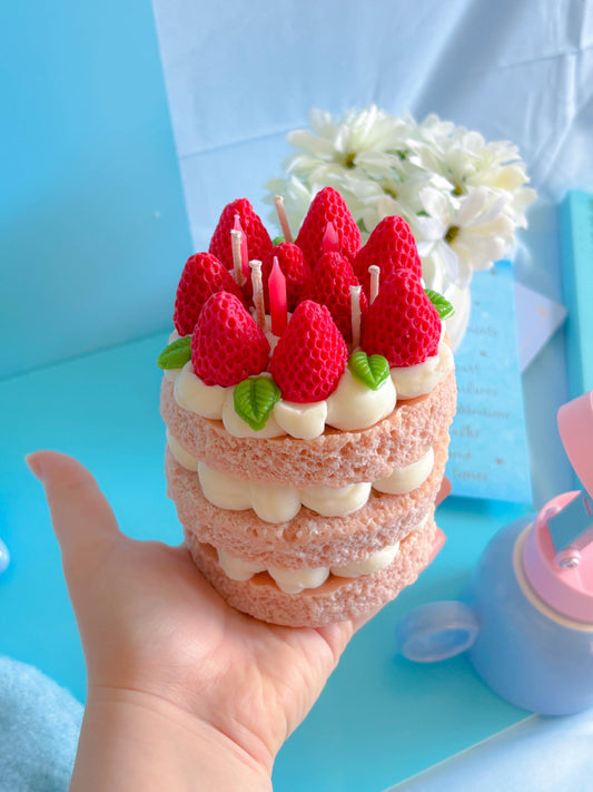 Cute three tier strawberry sponge cake candle